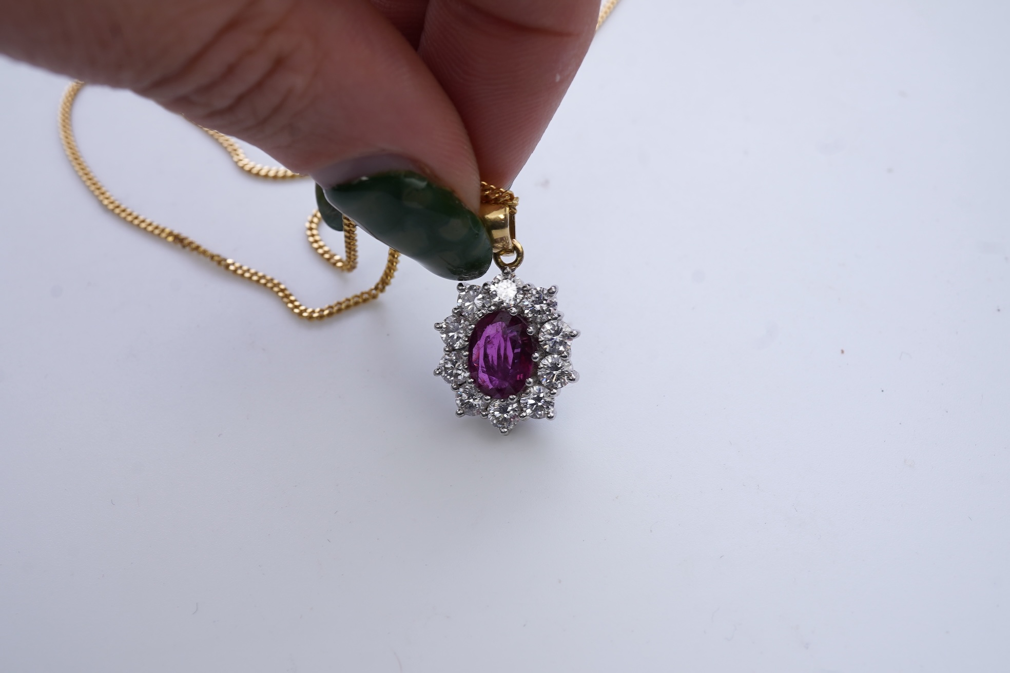 A ruby and diamond pendant